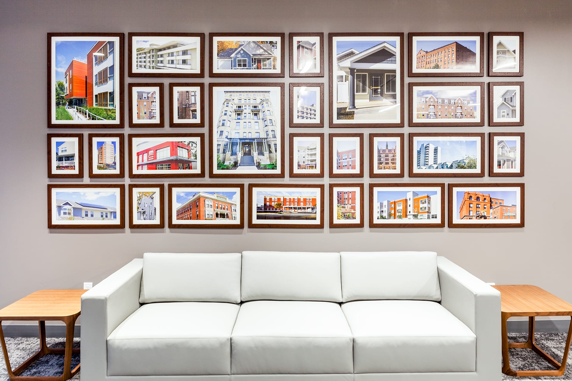 An installation of framed images of banks at the Federal Home Loan Bank of New York