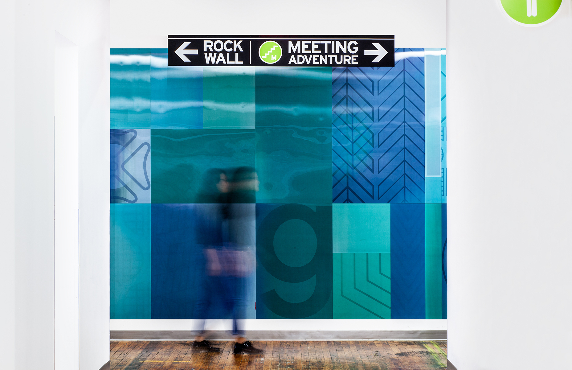 Glass graphics and signage and wayfinding at Neighborhood Inspired Workplace