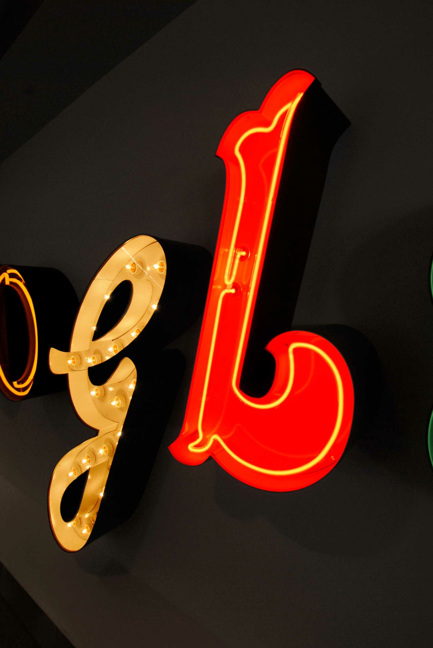 Close up of the neon L in the Google Doodle project