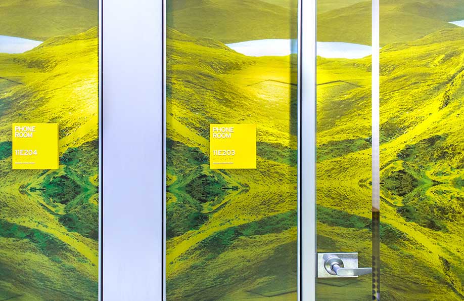 Glass graphics on conference room doors for Technology Evolves
