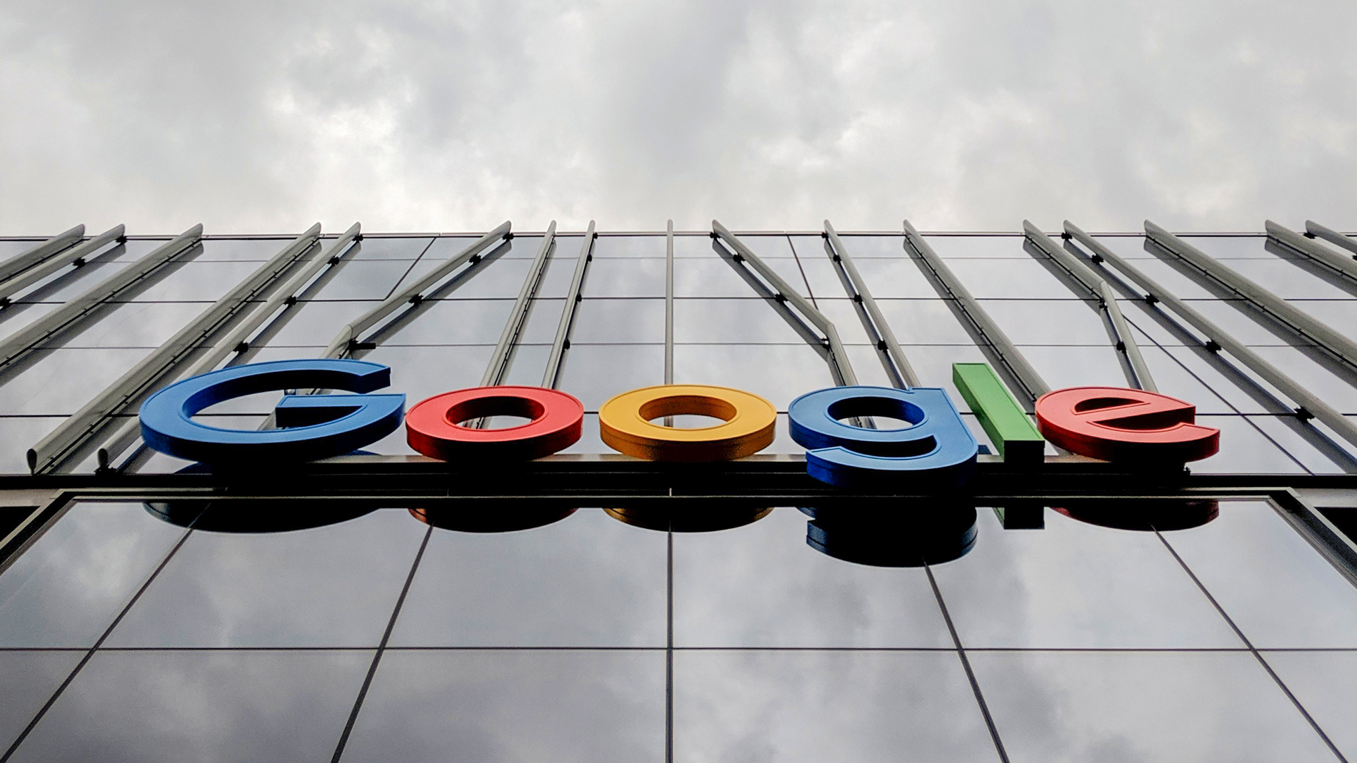 Google signage on a glass building.