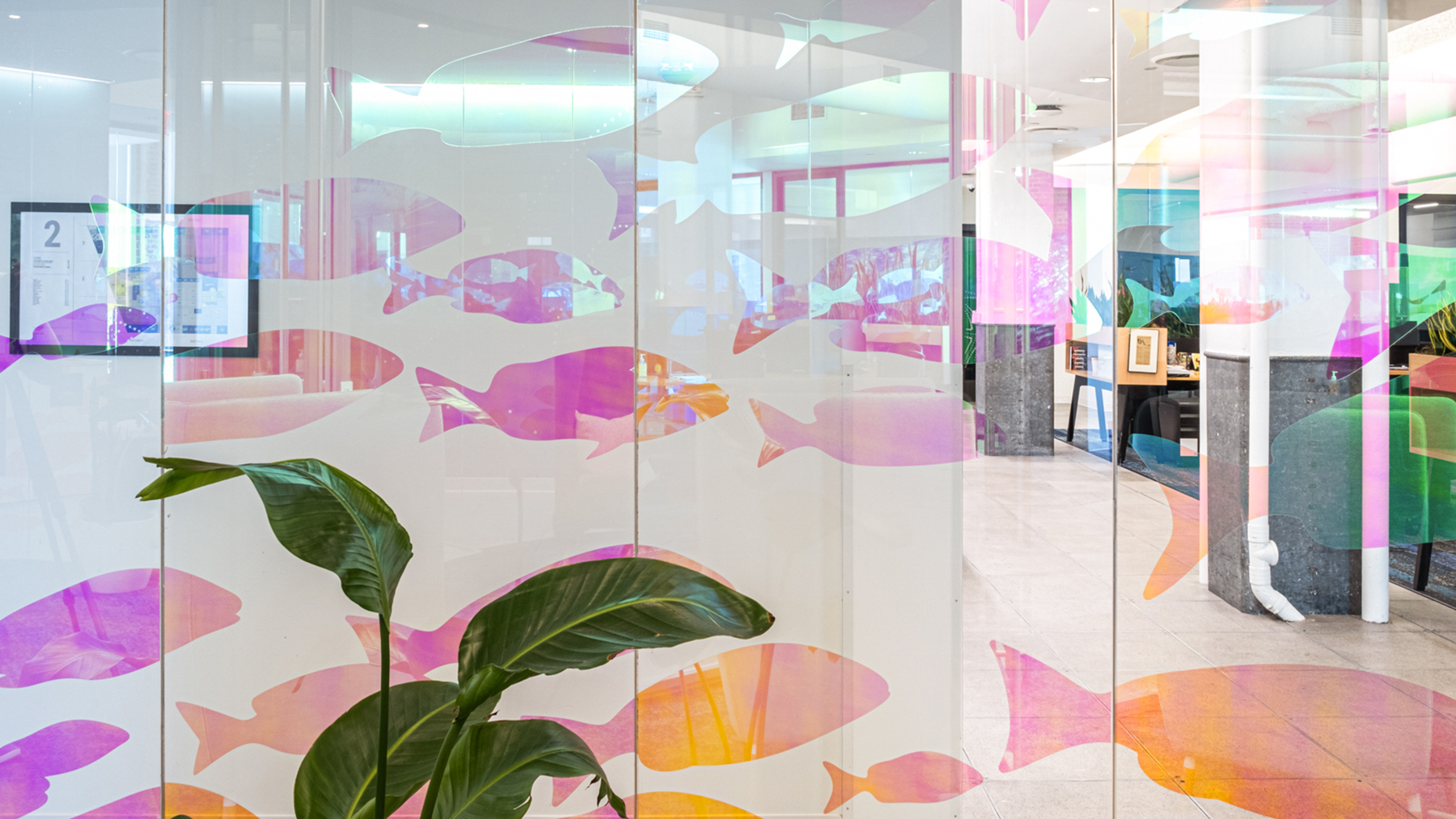 Dichroic graphics on glass depicting fish